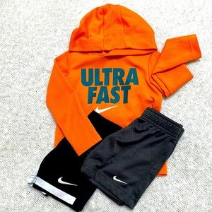 Nike Size 2t set. Dri-fit hooded long sleeve top with two pairs of shorts.